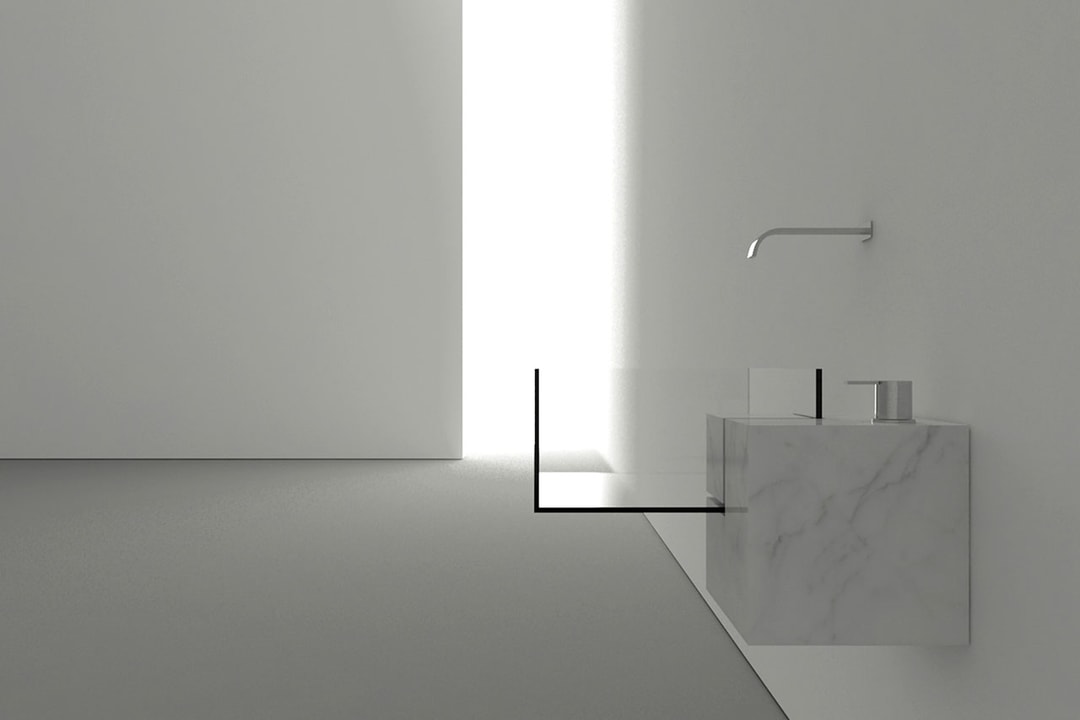 Виктор Васильев конструирует невидимую раковину для ванной из мрамора и стекла