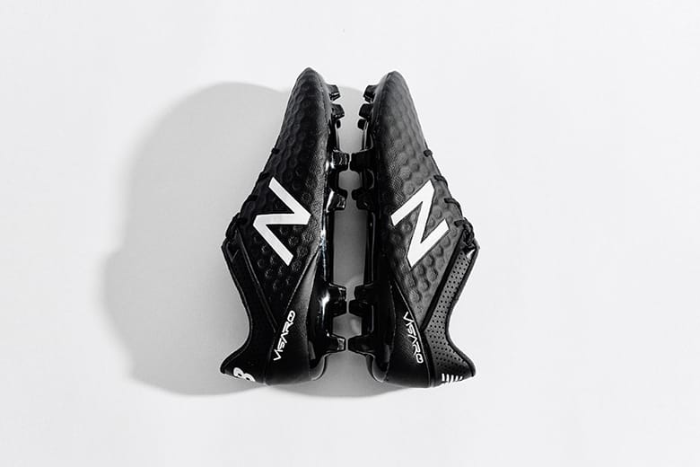 new balance all black football boots