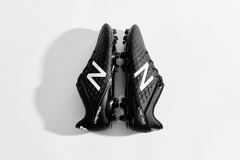 new balance black and blue football boots