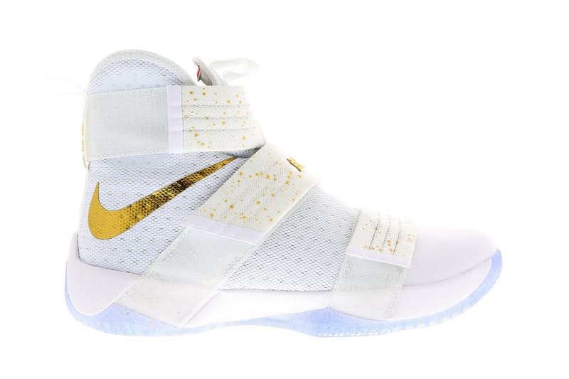 white nike shoes with gold swoosh