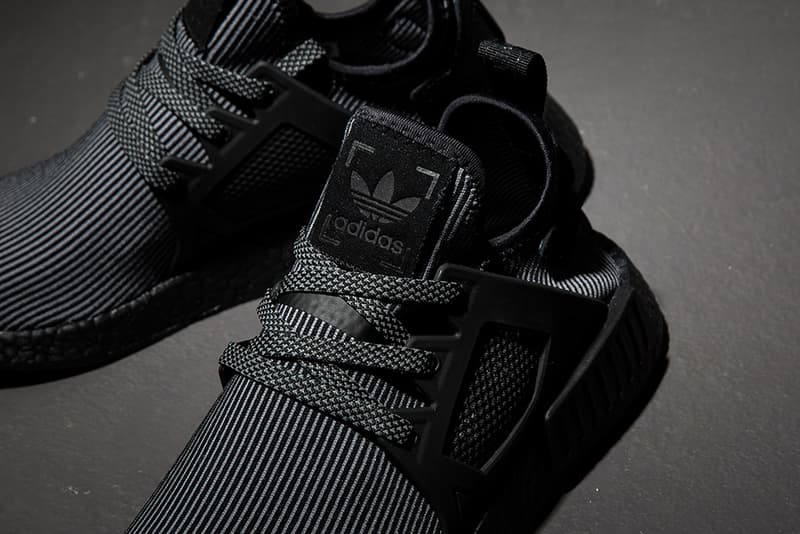 triple black nmd xr1