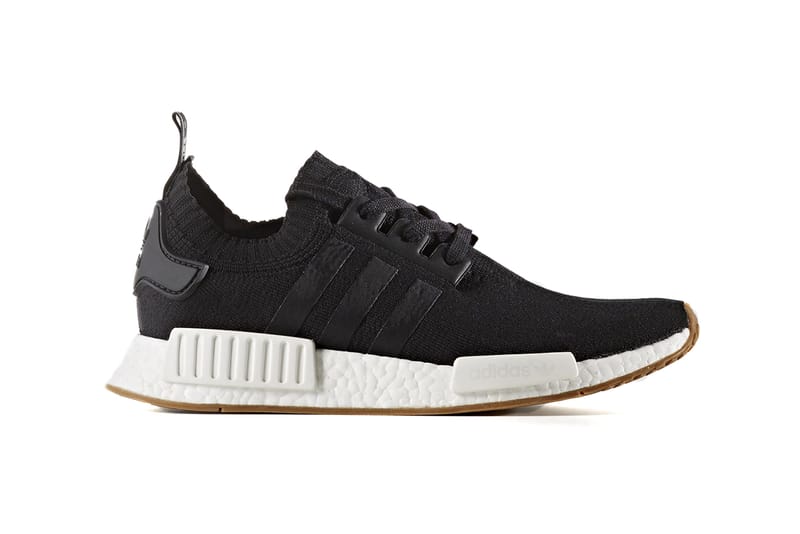 Nmd black 2025 with gum sole