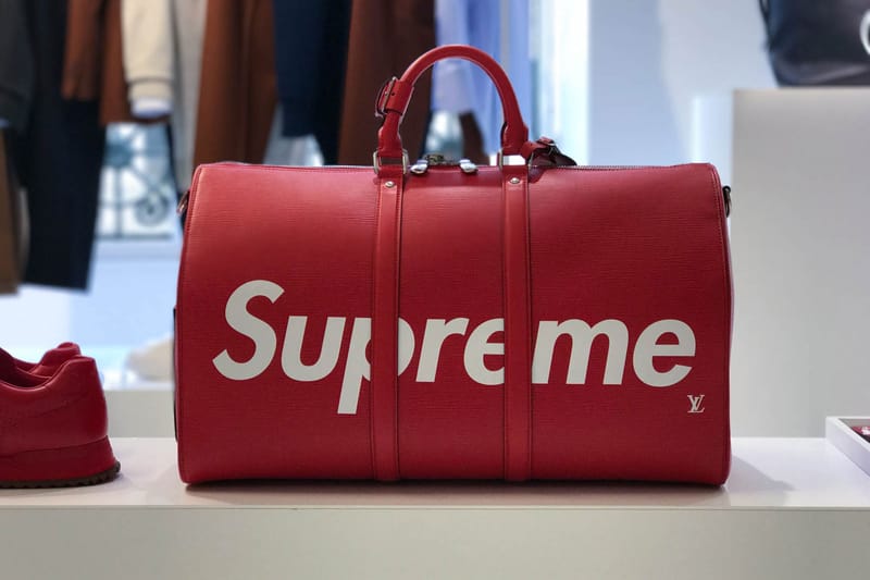 Supreme travel cheap bag replica