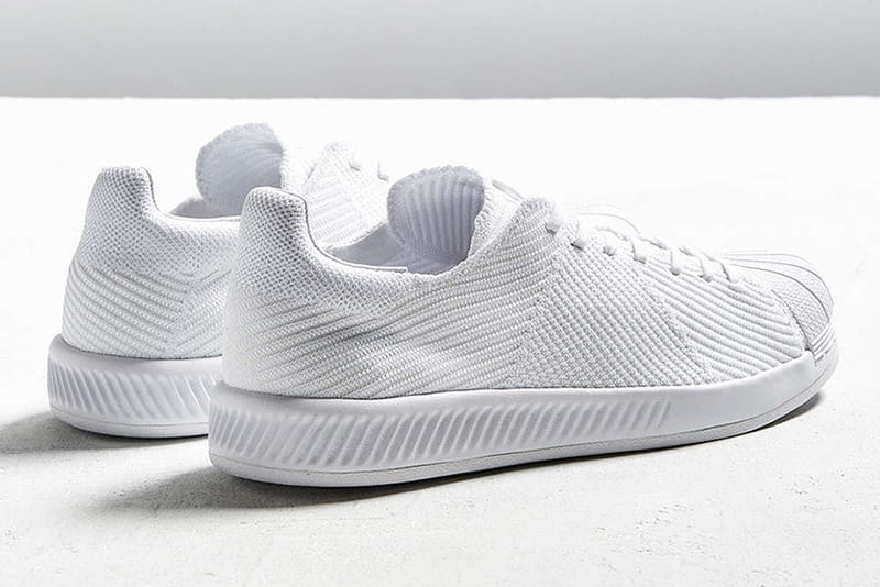 Adidas originals superstar boost hotsell primeknit sneakers in white