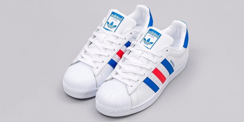 Superstar white shop with blue stripes