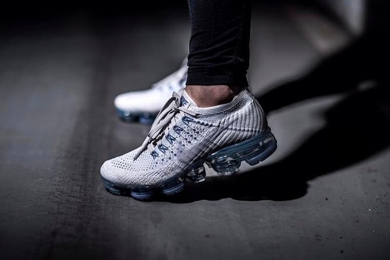 white vapormax with blue bottom