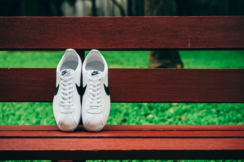 Nike cortez white hot sale black on feet