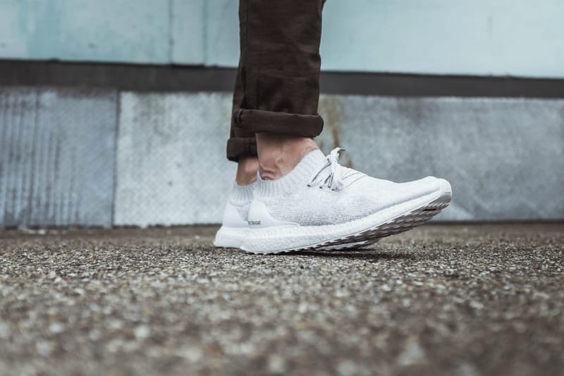 Adidas ultra boost uncaged 2025 triple white on feet