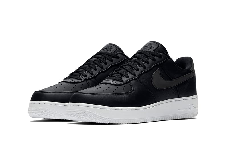 Nike air force shop 1 black white sole