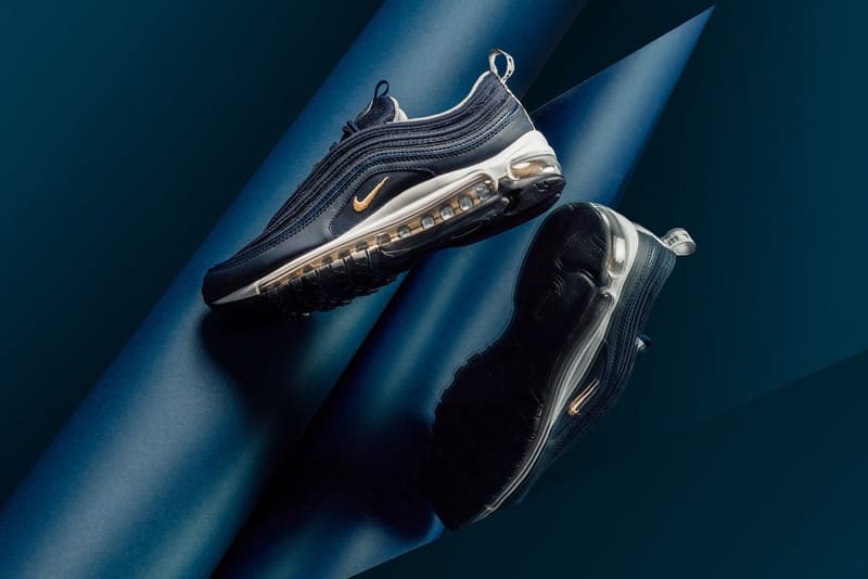 Navy blue shop and gold nikes