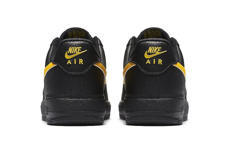 Black nike with yellow swoosh best sale