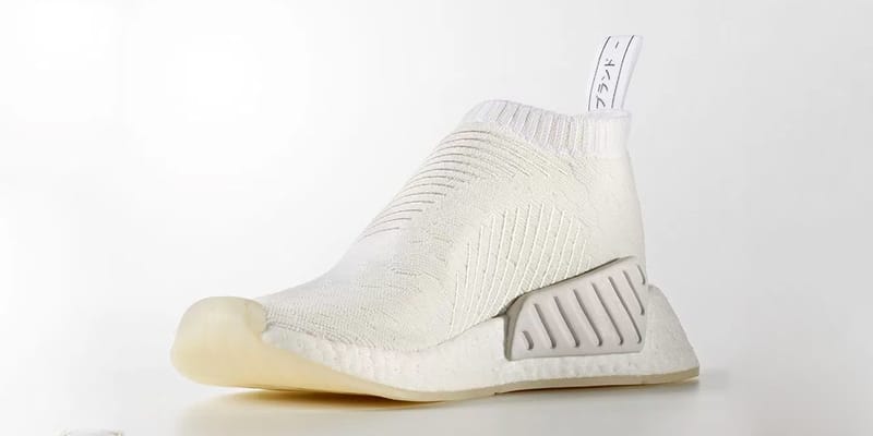 Adidas nmd cs2 store bianche con strisce nere