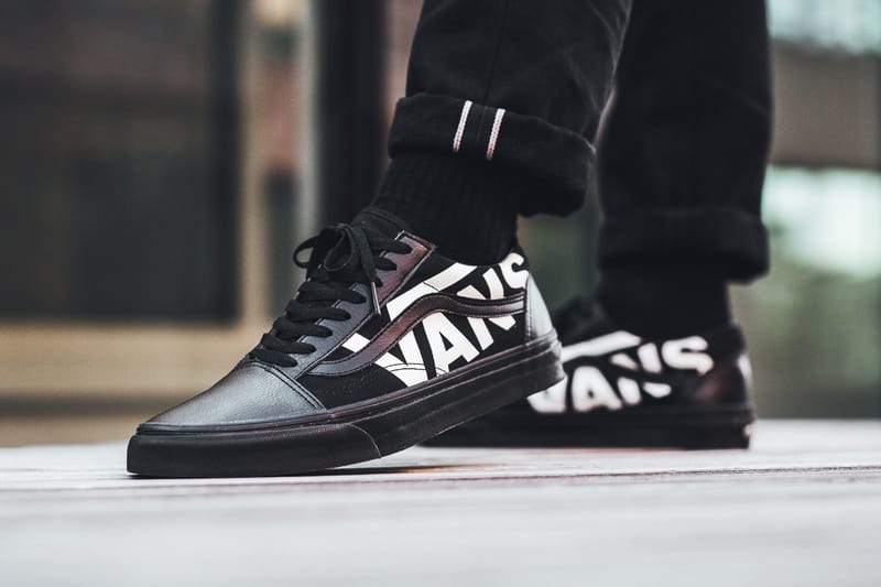 Vans with vans store logo all over