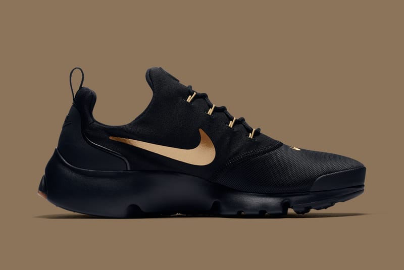 New black and store gold nikes