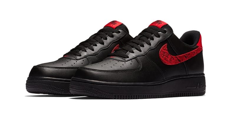 Nike air force 1 black with red on sale swoosh