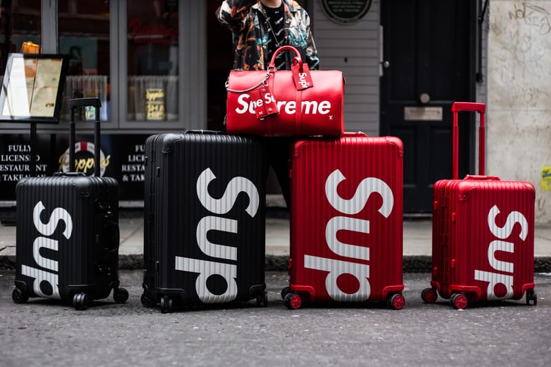 Supreme store red luggage