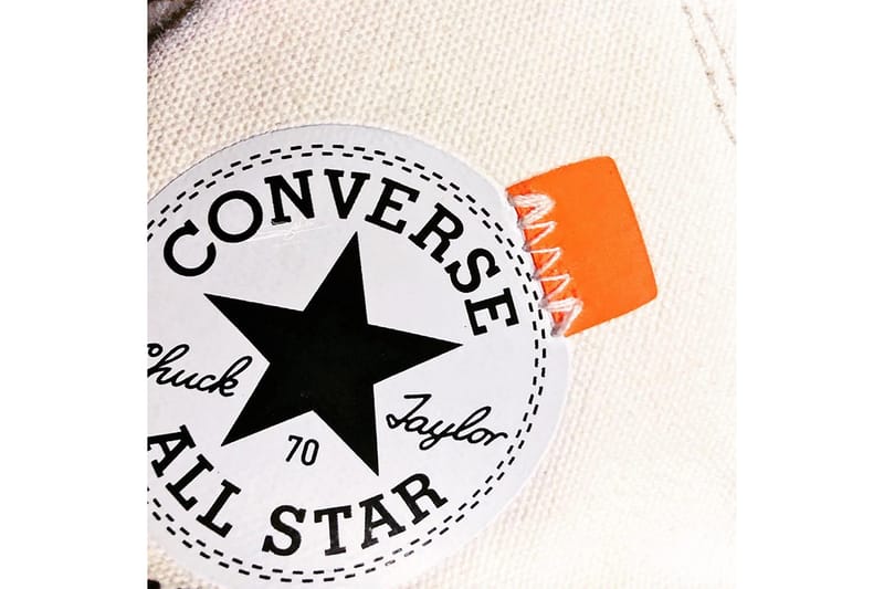 Off white converse orange tag best sale