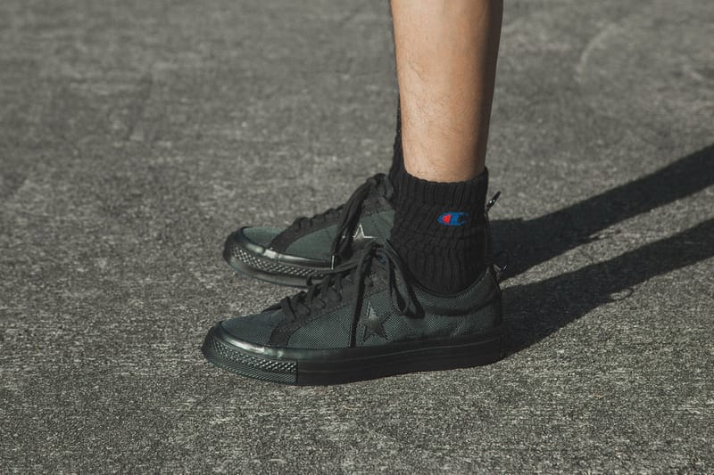 Converse one star store black on feet