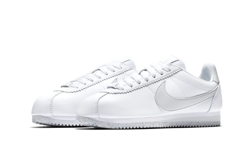 Silver nike cortez sale