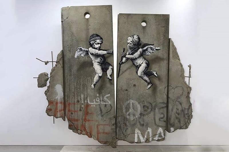 Banksy Separation Barrier @ World Travel Fair | Hypebeast