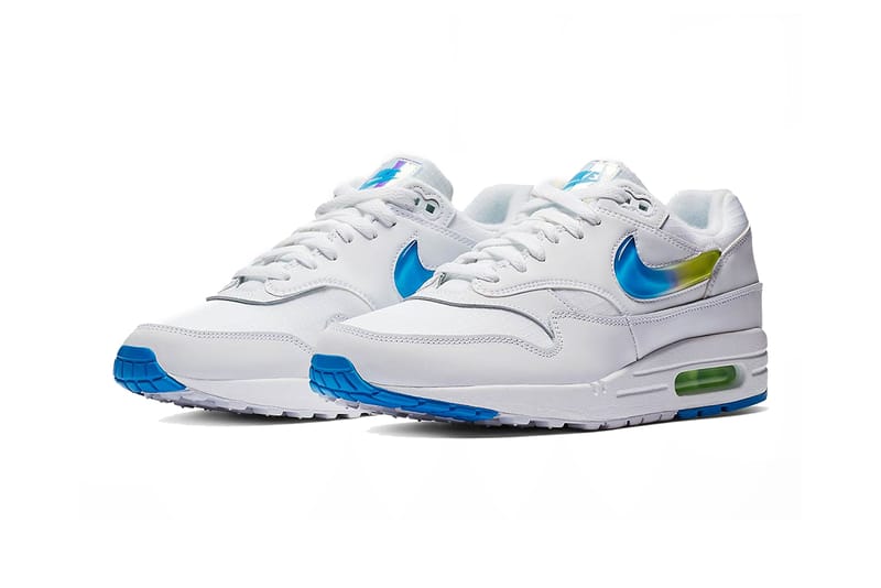 White and blue on sale nikes