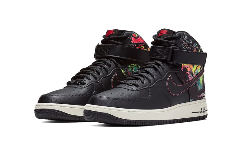 Black nikes with floral hot sale swoosh