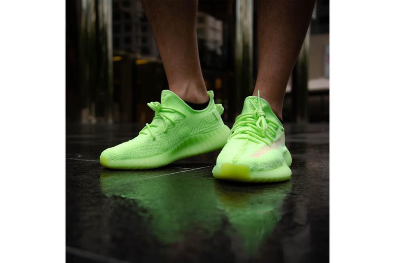 Yeezy glow in the dark sale on feet