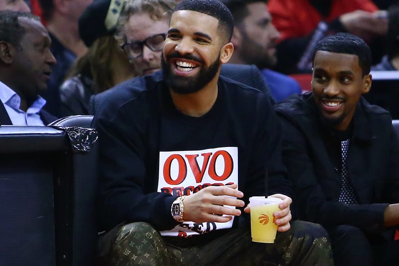 Drake wearing ovo store hoodie