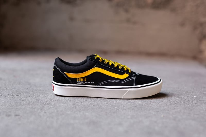 Black vans yellow laces hotsell