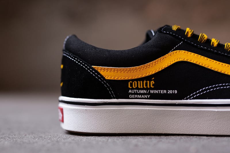 Yellow vans store with black stripe