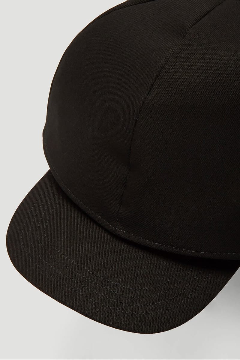 Raf Simons Strap Fastening Double Cap Release Info | Hypebeast