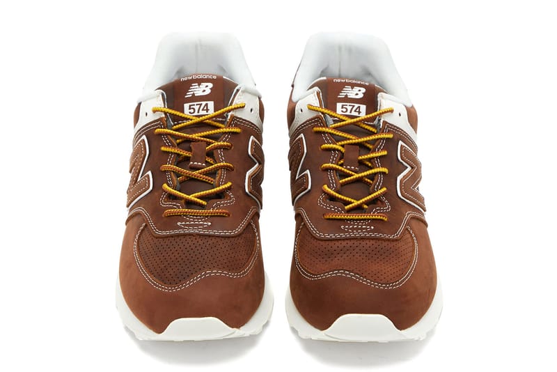 New balance hotsell brown suede trainers