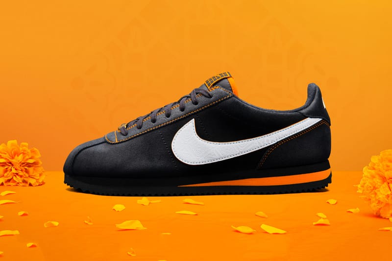 Nike cortez black and sales orange