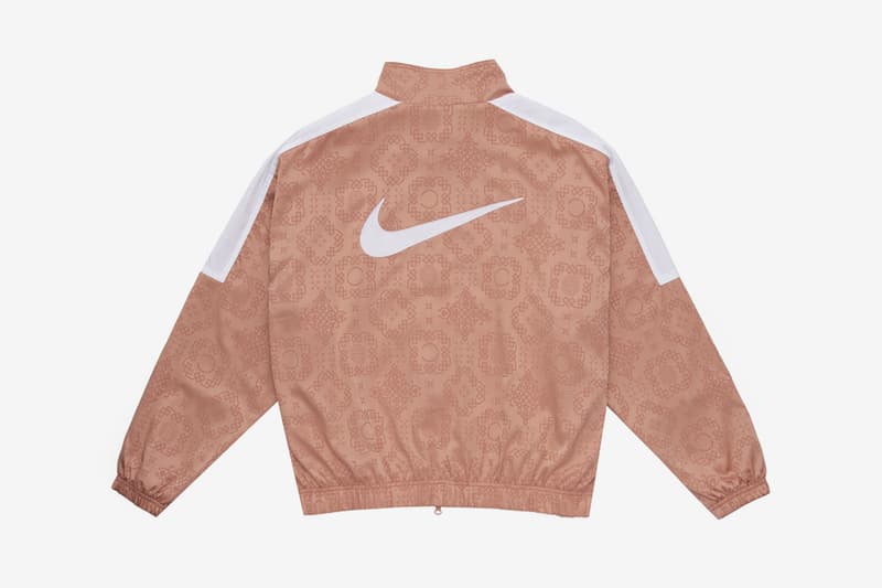 nike rose gold oversized swoosh joggers