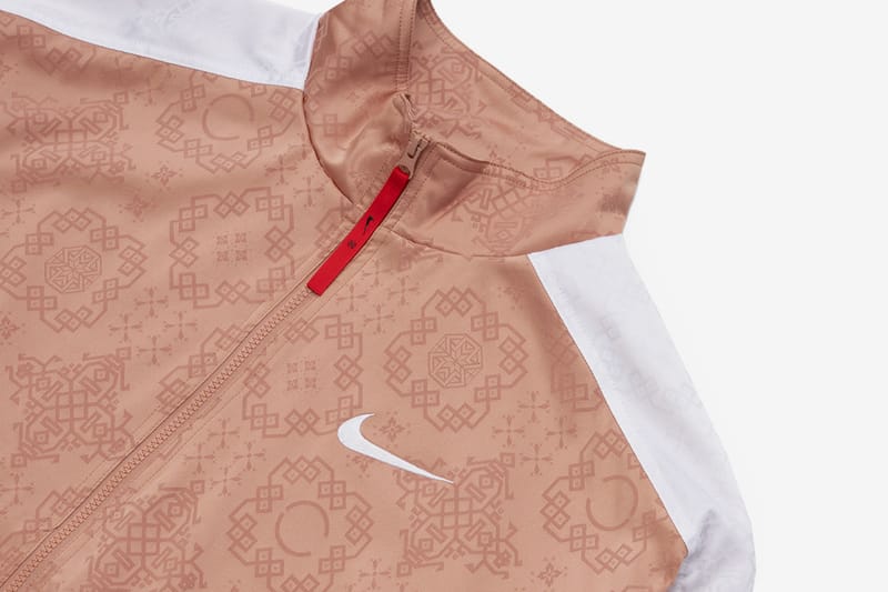 Nike rose gold online metallic air track jacket