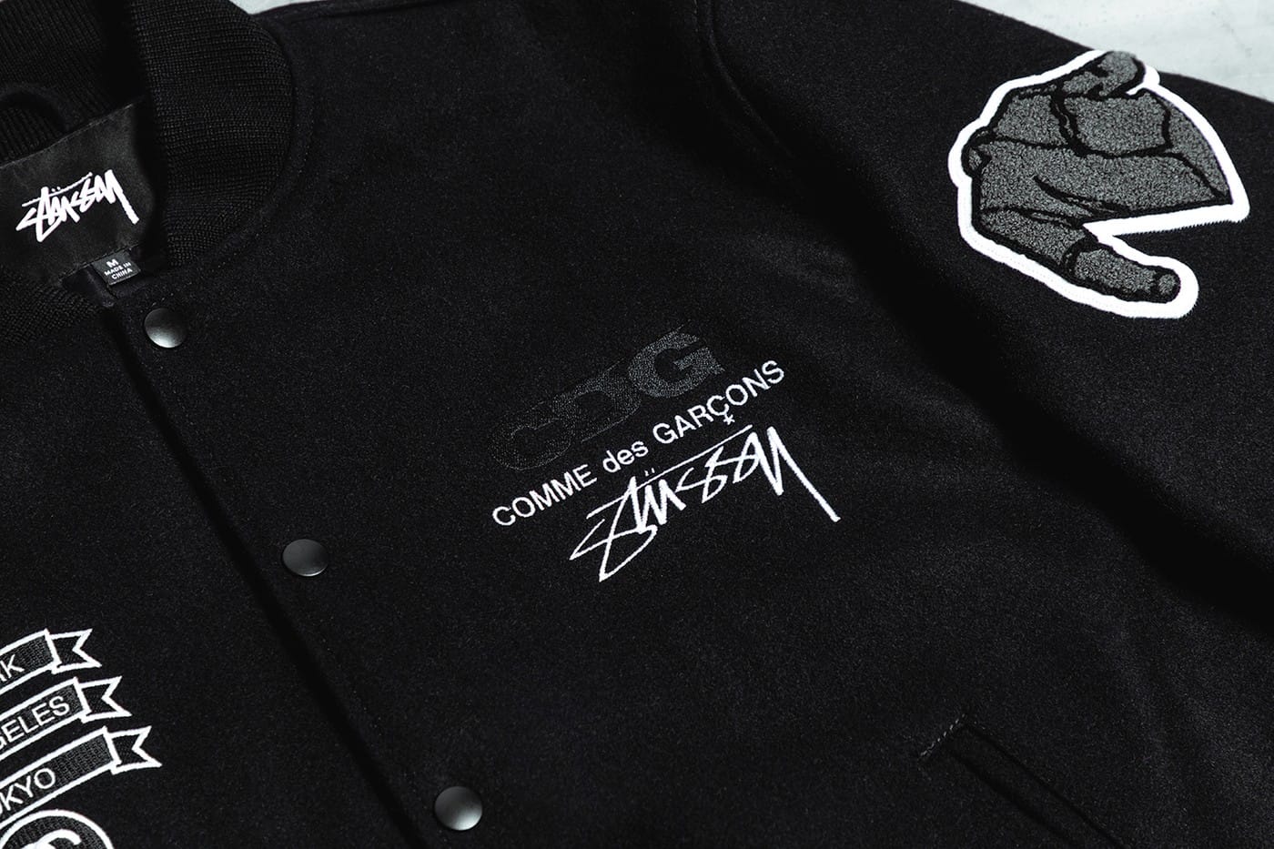 CDG x Stüssy 40th-Anniversary Varsity Jacket Closer Look | HYPEBEAST