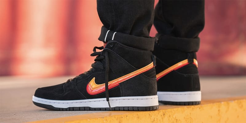 Black and orange 2025 high top nikes