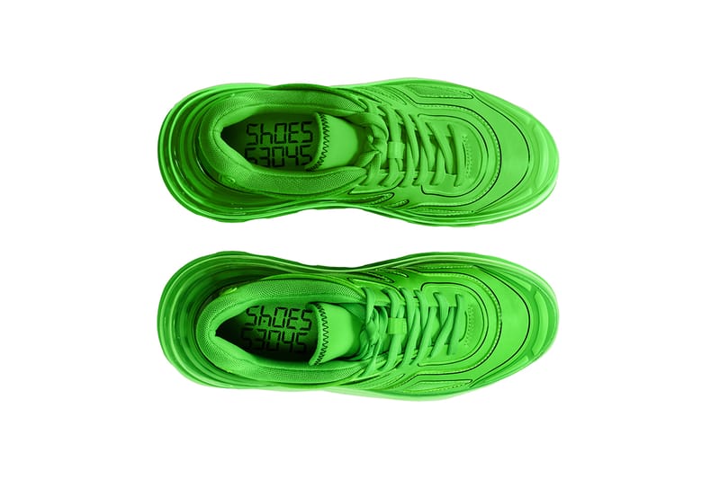 Neon green and store pink nike shoes