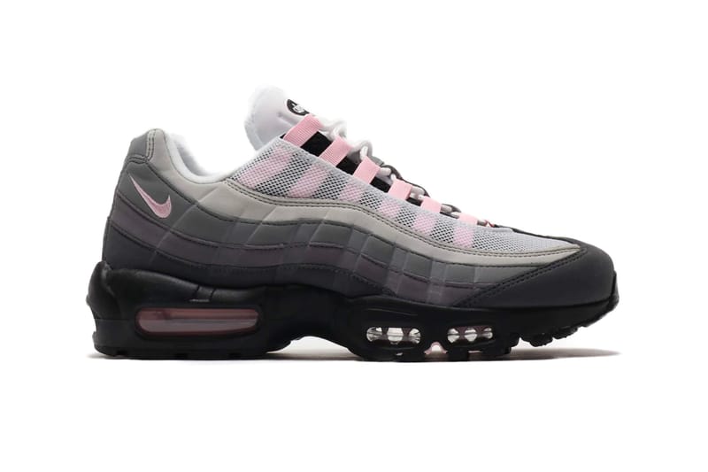 Grey nike shoes store with pink swoosh