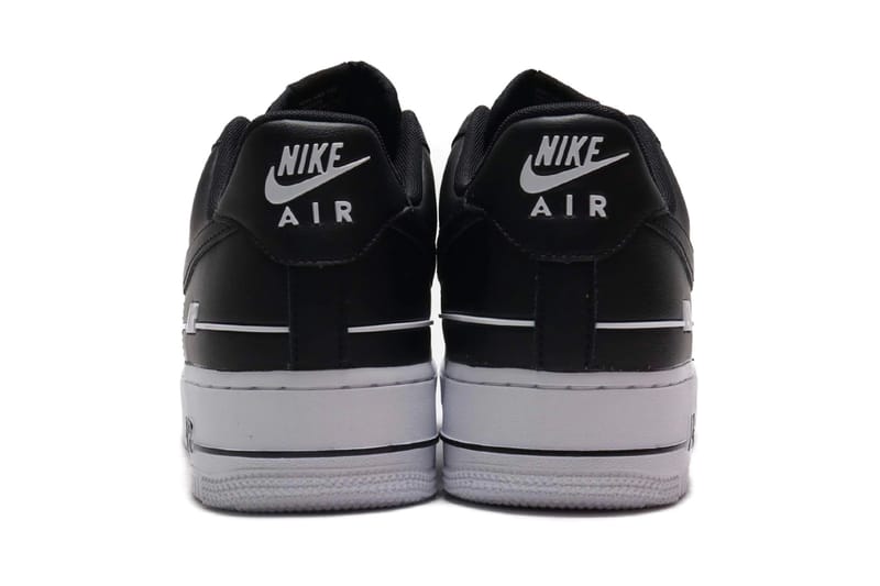 Nike black contrast swoosh best sale air force 1 trainers