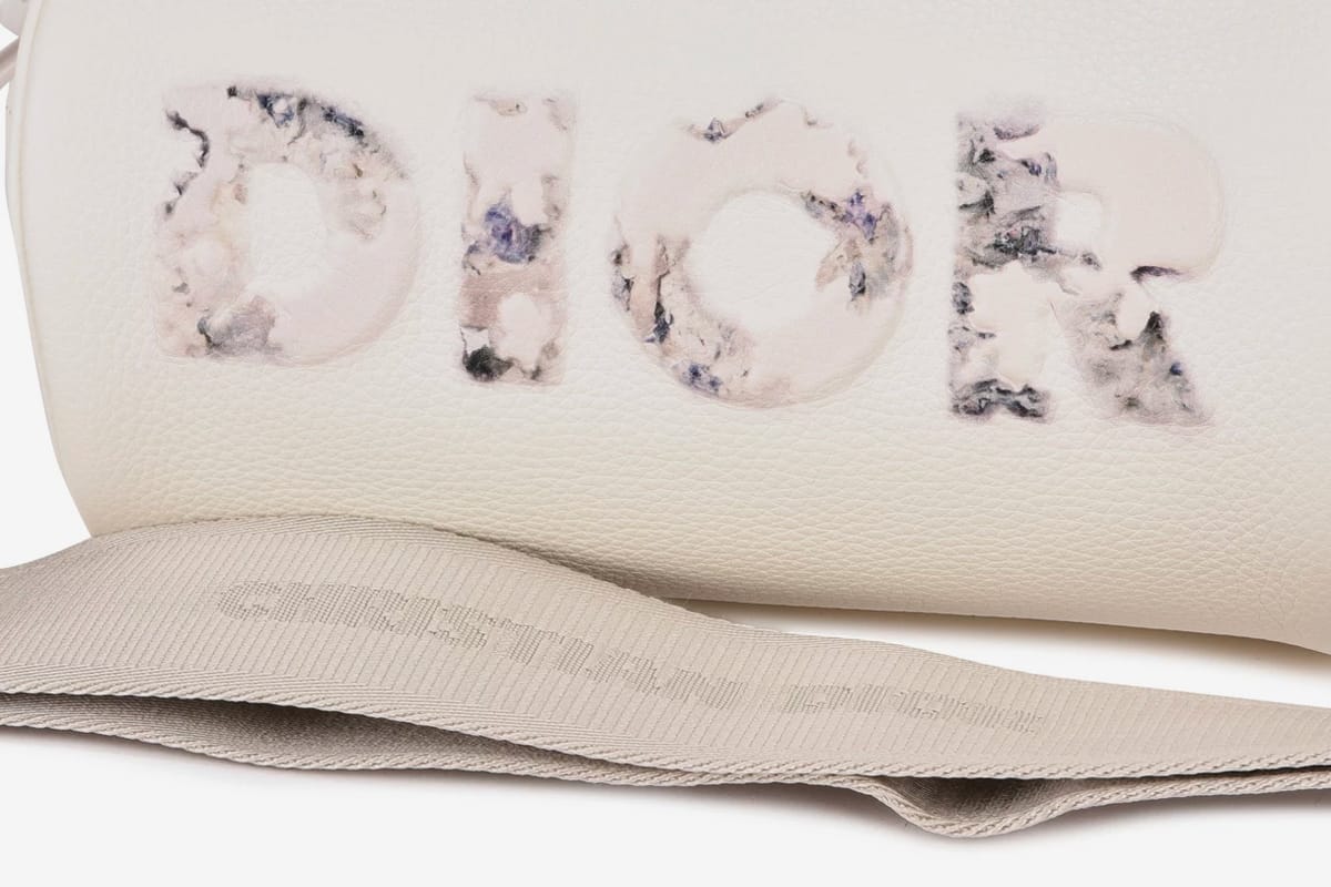 Daniel Arsham x Dior Grained Leather Roller Bag Release | Hypebeast