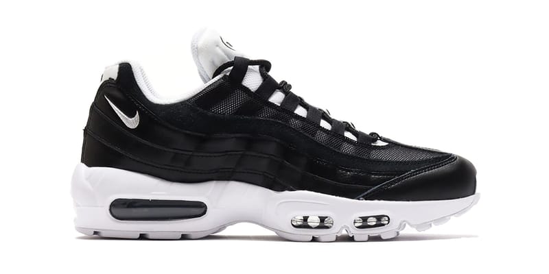 Nike white with black accent air max hotsell 95 trainers