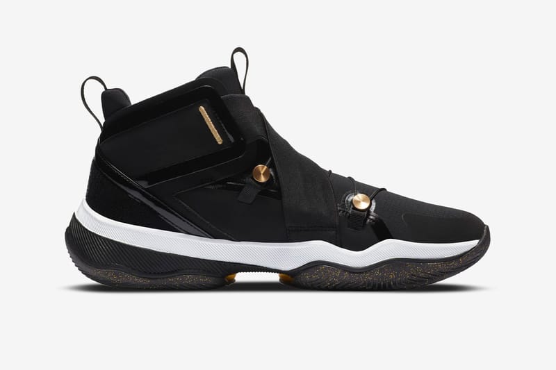 Michael jordan black hot sale and gold shoes