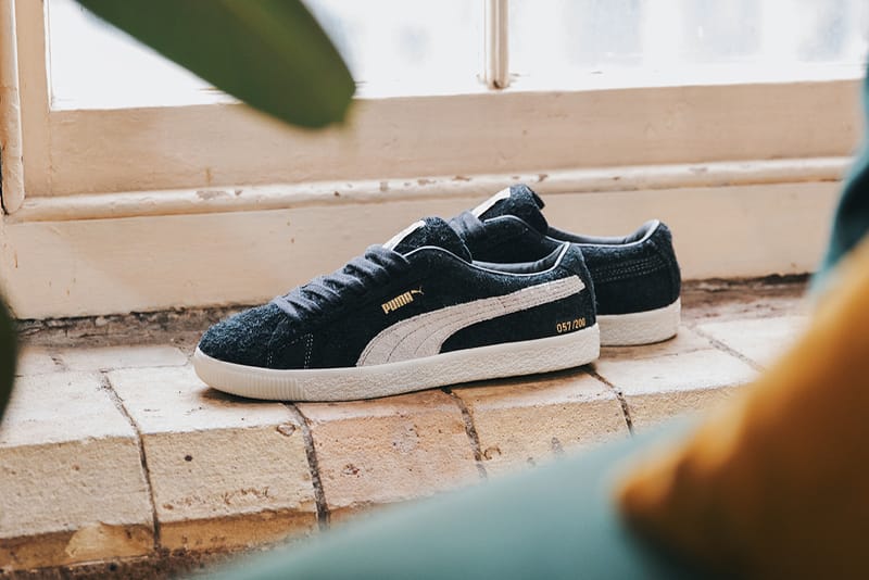 Black and cheap white suede pumas