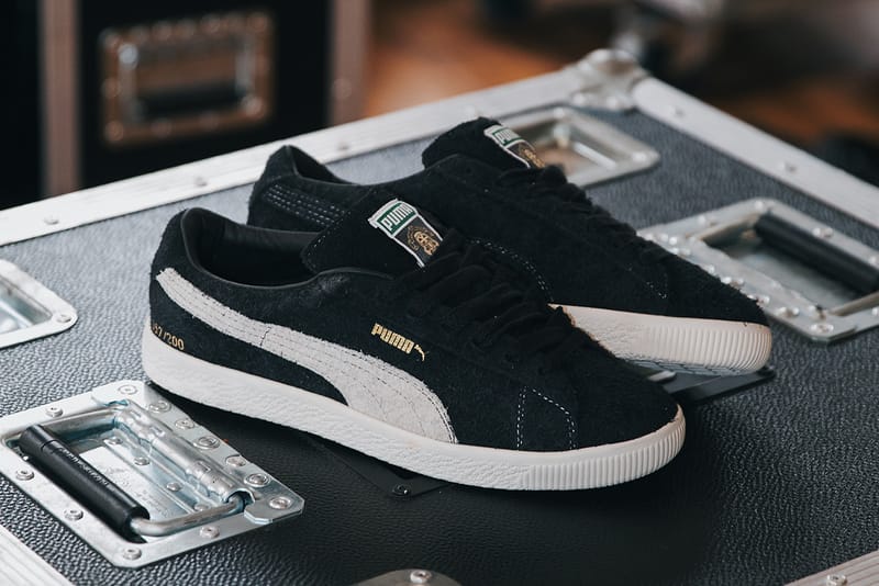 Puma suede store black white gold