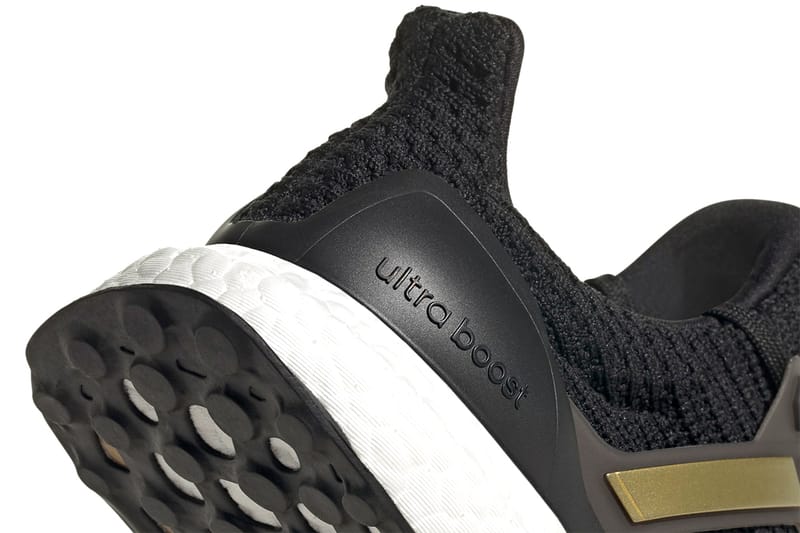 Adidas ultra boost triple best sale black gold