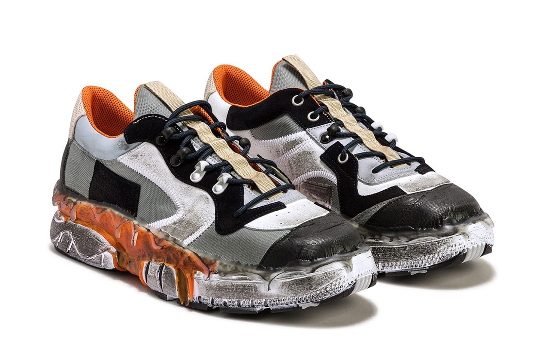 Embracing the Fusion of Black and Orange Sneakers