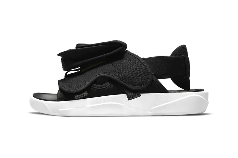 Black and best sale white jordan slides