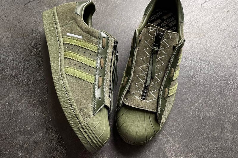 Adidas slip shop on olive green