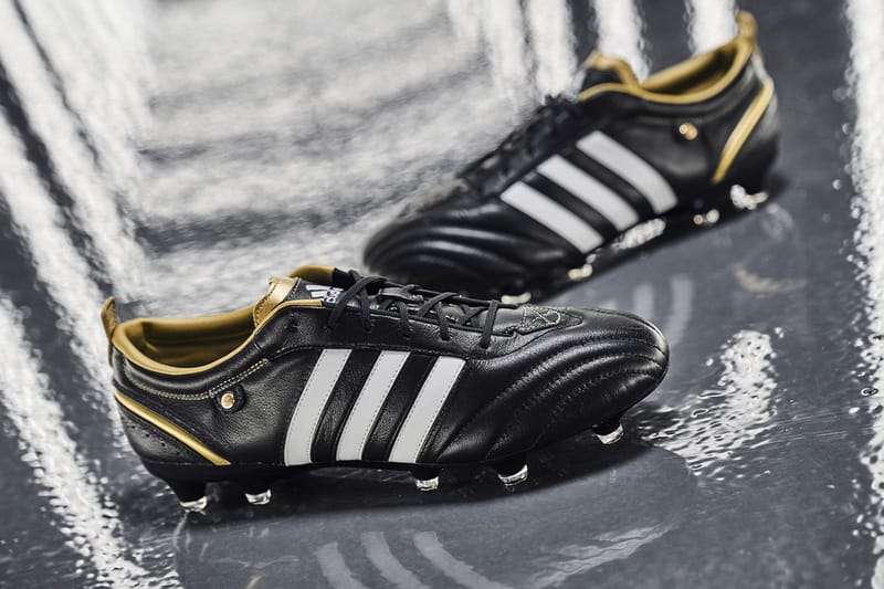 Black and gold adidas best sale football boots